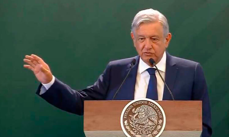 Imagen de AMLO con 4T de fondo